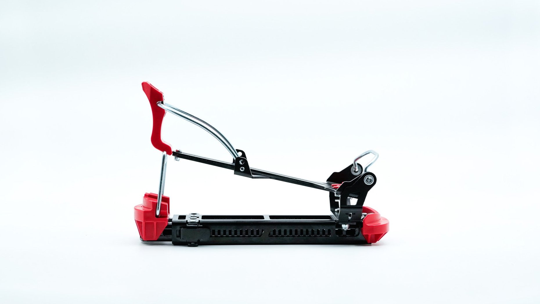Tjava Randi ski touring adapter shown from the side on a white background.